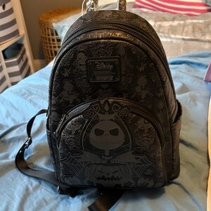 Loungefly nightmare before Christmas! glows in the dark.
